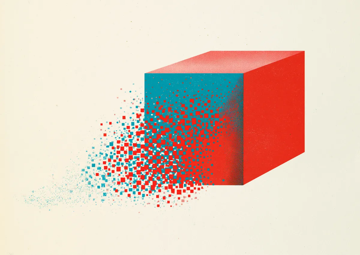 A red cube dissolving into scattered pixels at one edge