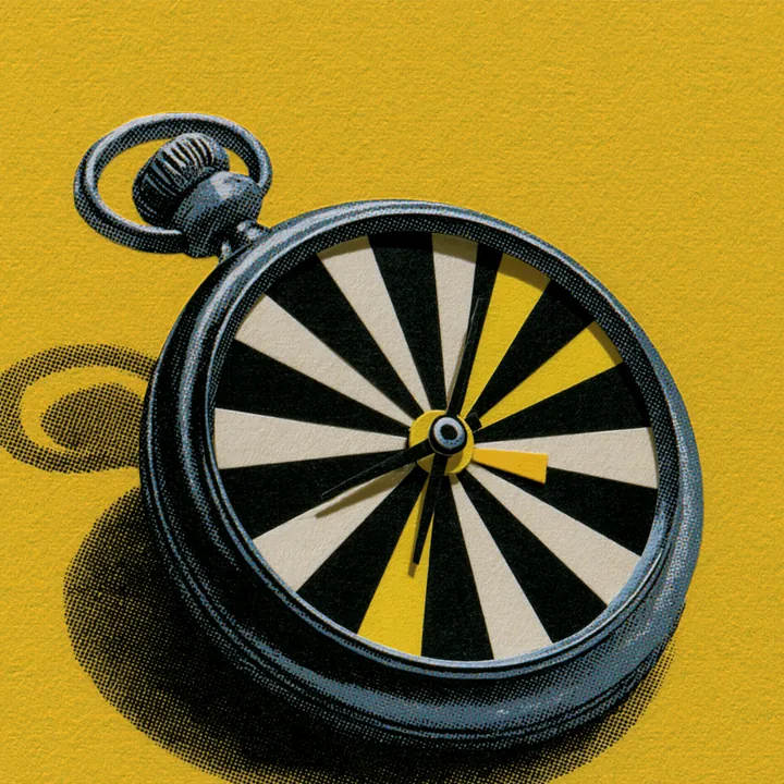 A dartboard with darts clustered near the center