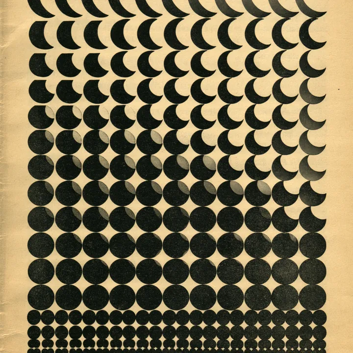 A dense grid of gold and black halftone dots fading across a field