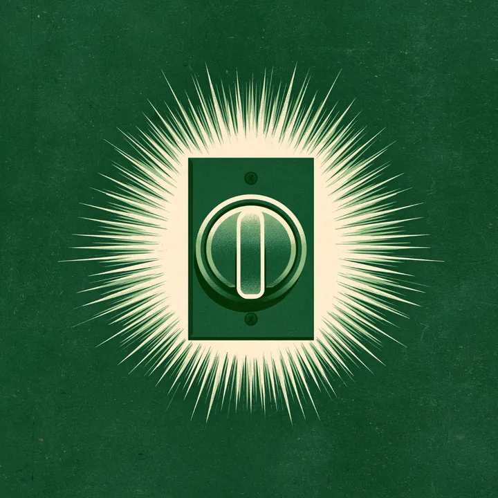 A glowing green power button radiating light on a dark ground