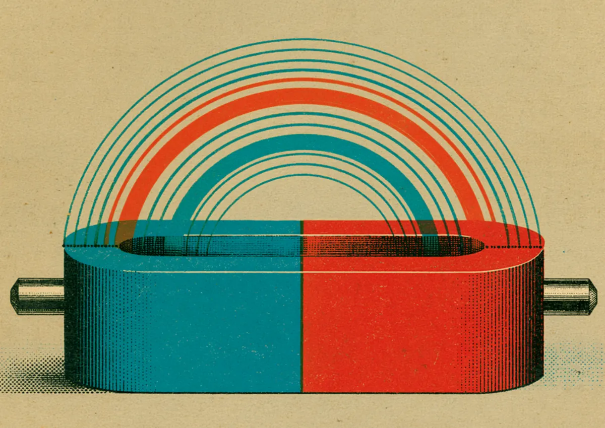 A red and teal horseshoe magnet arcing a rainbow between its poles