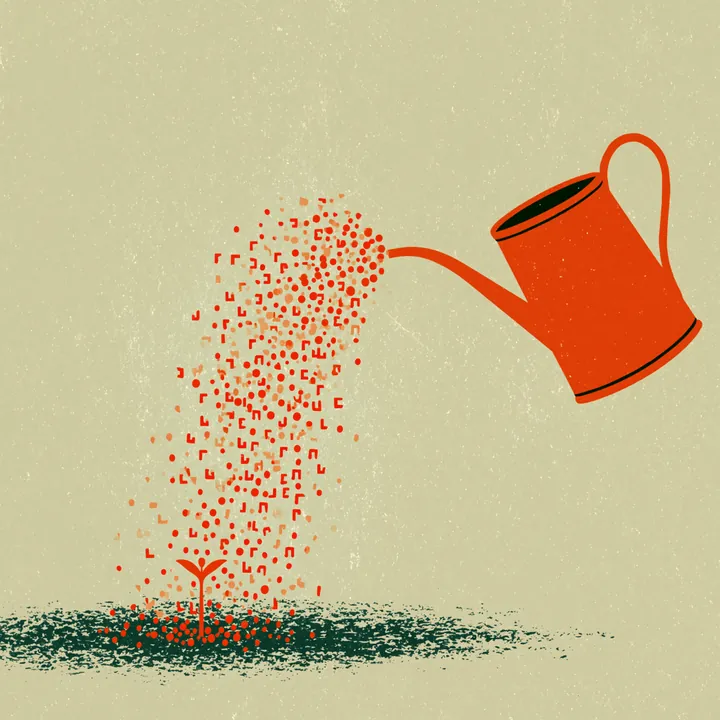 A watering can pouring a stream of dots onto the ground